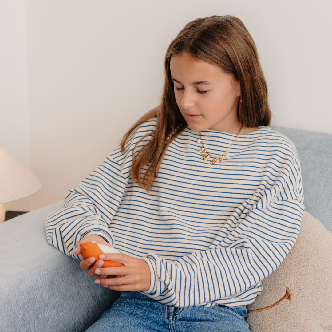 Young girl using moonbuddy for instant calm